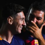 BARCELONA, SPAIN - AUGUST 05:  Lionel Messi (L) and Arda Turan of FC Barcelona  share a joke during the team official presentation ahead of the Joan Gamper trophy match at Camp Nou on August 5, 2015 in Barcelona, Spain.  (Photo by David Ramos/Getty Images)