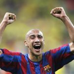Saint-Denis, FRANCE: Barcelona's Swedish forward Henrik Larsson celebrates after his team won the UEFA Champion's League final football match against Arsenal, 17 May 2006 at the Stade de France in Saint-Denis, northern Paris. Barcelona won 2 to 1. AFP PHOTO LLUIS GENE (Photo credit should read LLUIS GENE/AFP/Getty Images)