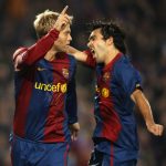 Barcelona, SPAIN:  Barcelona's Eidur Gudjohnson (L) celebrates after scoring against Werder Bremen with Deco during a Group A Champions League football match at the Nou Camp stadium in Barcelona, 05 December 2006.  AFP PHOTO/LLUIS GENE  (Photo credit should read LLUIS GENE/AFP/Getty Images)