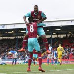 BLACKBURN, ENGLAND - FEBRUARY 21:  Emmanuel Emenike of West Ham United celebrates with teammate Cheikhou Kouyate #8 after scoring his team's third goal during The Emirates FA Cup fifth round match between Blackburn Rovers and West Ham United at Ewood park on February 21, 2016 in Blackburn, England.  (Photo by Jan Kruger/Getty Images)